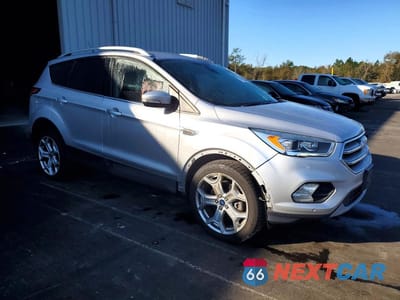 Czwarte zdjęcie samochodu z boku: 2019 FORD ESCAPE TITANIUM VIN:1FMCU0J90KUA03390 - miniatura