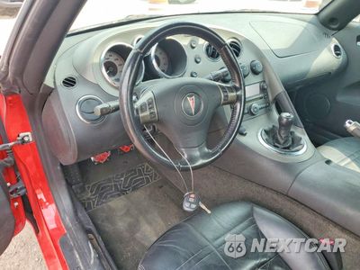 Zdjęcie 8 z 12 samochodu: 2006 PONTIAC SOLSTICE VIN:1G2MB33BX6Y104438 - miniatura