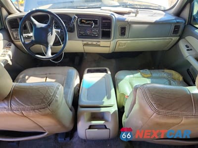 Zdjęcie 8 z 12 samochodu: 2001 CHEVROLET TAHOE C1500 VIN:1GNEC13T11J191651 - miniatura