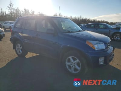 Czwarte zdjęcie samochodu z boku: 2003 TOYOTA RAV4 BASE VIN:JTEHH20V136070932 - miniatura