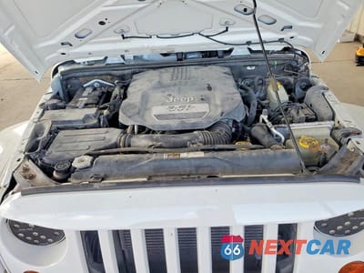 Zdjęcie 11 z 13 samochodu: 2013 JEEP WRANGLER UNLIMITED SAHARA VIN:1C4BJWEG1DL613053 - miniatura