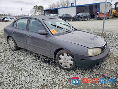 Czwarte zdjęcie samochodu z boku: 2002 HYUNDAI ELANTRA GLS VIN:KMHDN45D12U351559 - miniatura