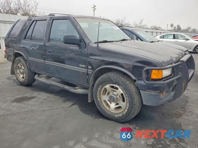 Czwarte zdjęcie samochodu z boku: 1997 ISUZU RODEO VIN:4S2CM58V0V4302679 - miniatura