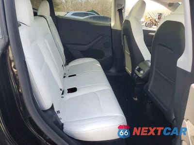 Zdjęcie 11 z 14 samochodu: 2025 TESLA MODEL Y VIN:7SAYGDEF0SA340790 - miniatura