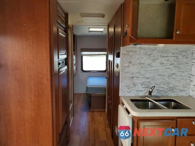 Zdjęcie 6 z 10 samochodu: 2006 FORD E450 RECREATIONAL VEHICLE VIN:1FDXE45S36DB36119 - miniatura