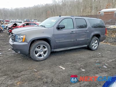 2010 CHEVROLET SUBURBAN K1500 LS 1GNUKHE37AR148650 - główne zdjęcie licytacji z USA - miniatura