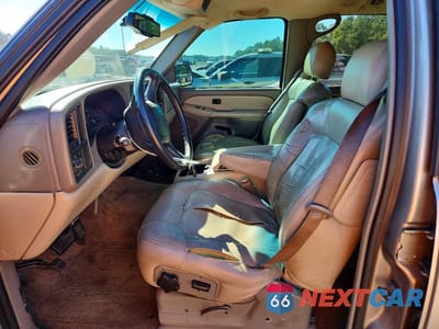 Zdjęcie 7 z 12 samochodu: 2001 CHEVROLET TAHOE C1500 VIN:1GNEC13T11J191651 - miniatura