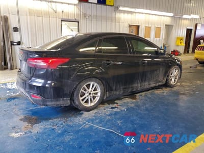 Trzecie zdjęcie samochodu z tyłu: 2015 FORD FOCUS SE VIN:1FADP3F21FL356395 - miniatura