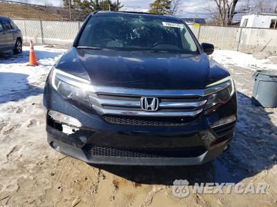 Piąte zdjęcie samochodu w środku: 2017 HONDA PILOT EXL VIN:5FNYF5H52HB000741 - miniatura