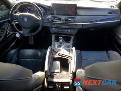 Zdjęcie 8 z 12 samochodu: 2013 BMW M5 VIN:WBSFV9C56DC773799 - miniatura