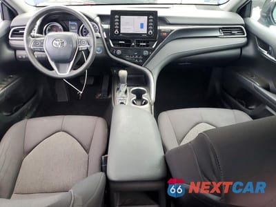 Zdjęcie 8 z 11 samochodu: 2021 TOYOTA CAMRY HYBRID LE VIN:4T1C31AKXMU559656 - miniatura