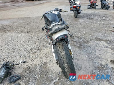 Czwarte zdjęcie samochodu z boku: 2003 HONDA CBR600 RR VIN:JH2PC37063M004720 - miniatura