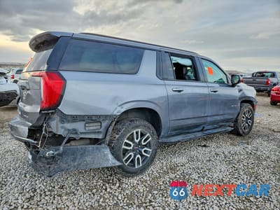 Trzecie zdjęcie samochodu z tyłu: 2021 GMC YUKON XL K1500 AT4 VIN:1GKS2HKD7MR281625 - miniatura