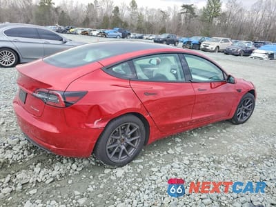 Trzecie zdjęcie samochodu z tyłu: 2023 TESLA MODEL 3 VIN:5YJ3E1EB1PF620124 - miniatura