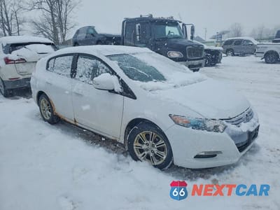 Czwarte zdjęcie samochodu z boku: 2010 HONDA INSIGHT EX VIN:JHMZE2H75AS036793 - miniatura