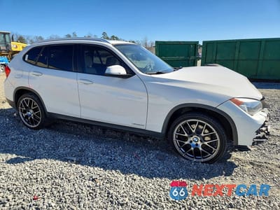Czwarte zdjęcie samochodu z boku: 2014 BMW X1 XDRIVE28I VIN:WBAVL1C5XEVY11175 - miniatura
