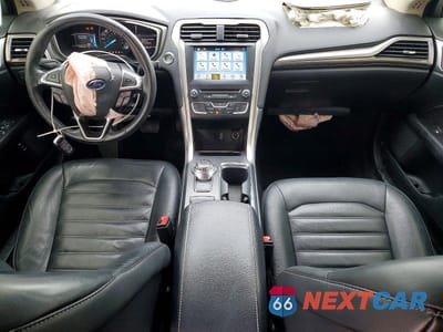 Zdjęcie 8 z 11 samochodu: 2017 FORD FUSION SE HYBRID VIN:3FA6P0LU8HR163677 - miniatura