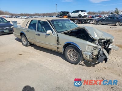 Czwarte zdjęcie samochodu z boku: 1997 LINCOLN TOWN CAR EXECUTIVE VIN:1LNLM81W1VY681650 - miniatura