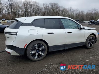 Trzecie zdjęcie samochodu z tyłu: 2023 BMW IX XDRIVE50 VIN:WB523CF08PCL95980 - miniatura