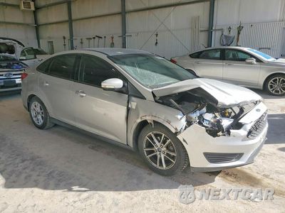 Czwarte zdjęcie samochodu z boku: 2017 FORD FOCUS SE VIN:1FADP3F25HL317294 - miniatura