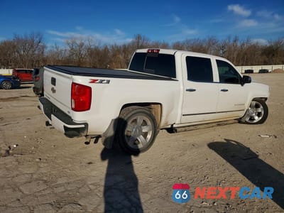 Trzecie zdjęcie samochodu z tyłu: 2018 CHEVROLET SILVERADO K1500 LTZ VIN:3GCUKSEJ3JG204734 - miniatura