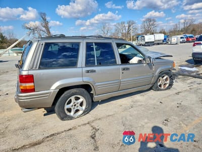 Trzecie zdjęcie samochodu z tyłu: 1998 JEEP GRAND CHEROKEE LIMITED 5.9L VIN:1J4GZ88Z0WC119450 - miniatura