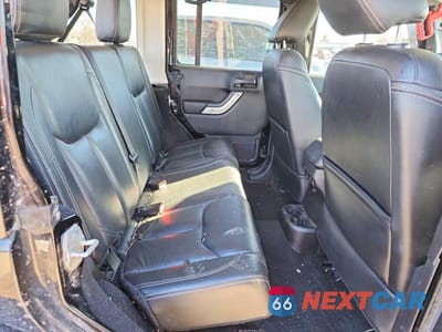 Zdjęcie 11 z 12 samochodu: 2015 JEEP WRANGLER UNLIMITED SAHARA VIN:1C4BJWEG0FL754330 - miniatura