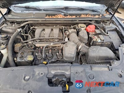 Zdjęcie 11 z 12 samochodu: 2014 FORD TAURUS LIMITED VIN:1FAHP2F88EG110984 - miniatura
