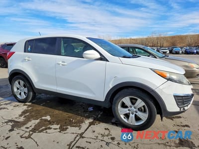 Czwarte zdjęcie samochodu z boku: 2012 KIA SPORTAGE LX VIN:KNDPB3A27C7195021 - miniatura