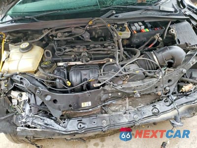 Zdjęcie 11 z 11 samochodu: 2006 FORD FOCUS ZX3 VIN:1FAFP31NX6W227614 - miniatura