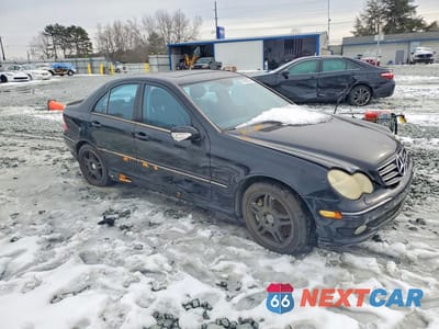 Czwarte zdjęcie samochodu z boku: 2002 MERCEDES-BENZ C 32 AMG KOMPRESSOR VIN:WDBRF65J02F232851 - miniatura