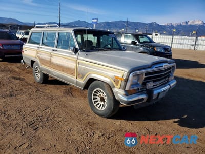 Czwarte zdjęcie samochodu z boku: 1987 JEEP GRAND WAGONEER VIN:1JCNJ15UXHT006109 - miniatura