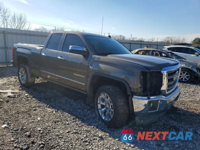 Czwarte zdjęcie samochodu z boku: 2014 GMC SIERRA K1500 SLT VIN:1GTV2VEC3EZ117283 - miniatura