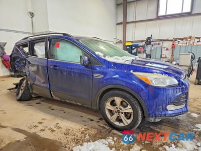 Czwarte zdjęcie samochodu z boku: 2014 FORD ESCAPE SE VIN:1FMCU9GX1EUC88180 - miniatura