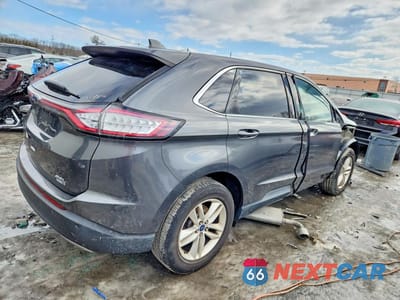 Trzecie zdjęcie samochodu z tyłu: 2017 FORD EDGE SEL VIN:2FMPK4J98HBB14301 - miniatura