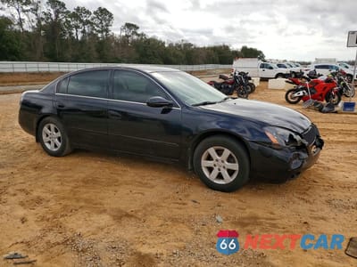 Czwarte zdjęcie samochodu z boku: 2002 NISS ALTIMA 2.5 VIN:1N4AL11D62C206935 - miniatura
