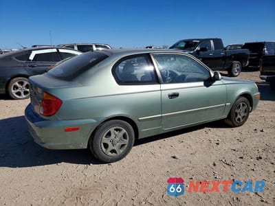 Trzecie zdjęcie samochodu z tyłu: 2004 HYUNDAI ACCENT GL VIN:KMHCG35C84U311439 - miniatura