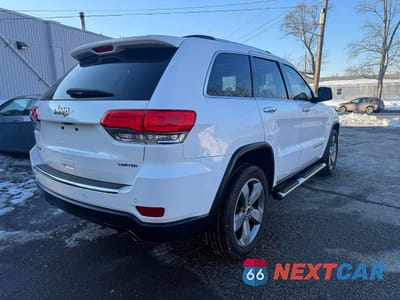 Czwarte zdjęcie samochodu z boku: 2014 JEEP GRAND CHEROKEE LIMITED VIN:1C4RJFBG1EC408529 - miniatura