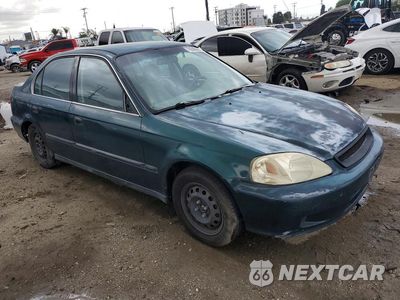 Czwarte zdjęcie samochodu z boku: 1999 HONDA CIVIC LX VIN:JHMEJ6576XS000934 - miniatura