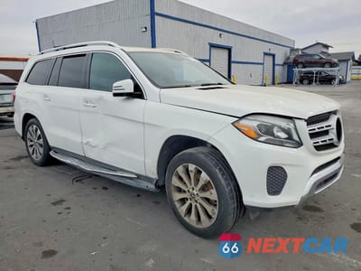 Czwarte zdjęcie samochodu z boku: 2017 MERCEDES-BENZ GLS 450 4MATIC VIN:4JGDF6EE4HA942951 - miniatura