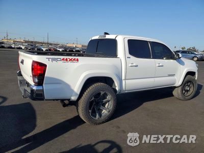 Trzecie zdjęcie samochodu z tyłu: 2023 TOYOTA TACOMA DOUBLE CAB VIN:3TMAZ5CN6PM202959 - miniatura