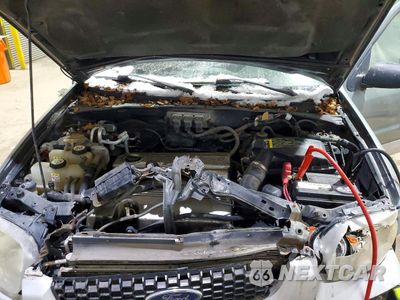 Zdjęcie 11 z 12 samochodu: 2006 FORD ESCAPE HEV VIN:1FMYU96H76KA39928 - miniatura