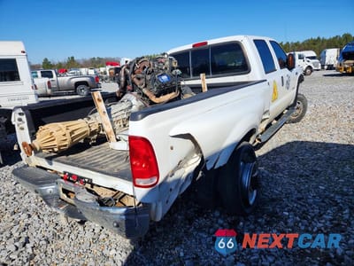 Trzecie zdjęcie samochodu z tyłu: 2003 FORD F350 SUPER DUTY VIN:1FTWW33P73EC51785 - miniatura