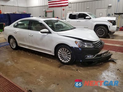 Czwarte zdjęcie samochodu z boku: 2016 VOLKSWAGEN PASSAT SE VIN:1VWBT7A3XGC043249 - miniatura