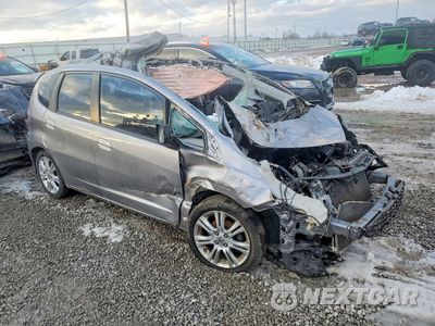 Czwarte zdjęcie samochodu z boku: 2009 HONDA FIT SPORT VIN:JHMGE88449S052320 - miniatura