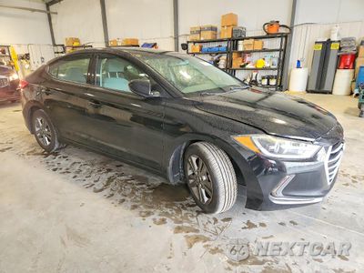 Czwarte zdjęcie samochodu z boku: 2018 HYUNDAI ELANTRA VALUE EDITION VIN:5NPD84LF4JH288224 - miniatura