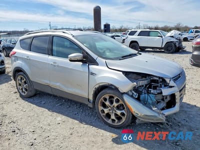 Czwarte zdjęcie samochodu z boku: 2013 FORD ESCAPE TITANIUM VIN:1FMCU0J91DUB28482 - miniatura