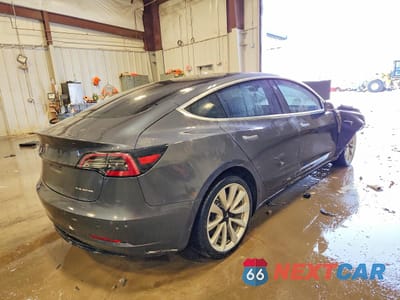 Trzecie zdjęcie samochodu z tyłu: 2018 TESLA MODEL 3 VIN:5YJ3E1EB5JF090652 - miniatura