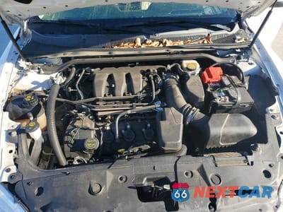 Zdjęcie 11 z 11 samochodu: 2018 FORD TAURUS SEL VIN:1FAHP2E83JG125386 - miniatura