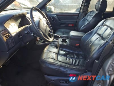 Zdjęcie 7 z 11 samochodu: 2000 JEEP GRAND CHEROKEE LIMITED VIN:1J4GW58N2YC296606 - miniatura